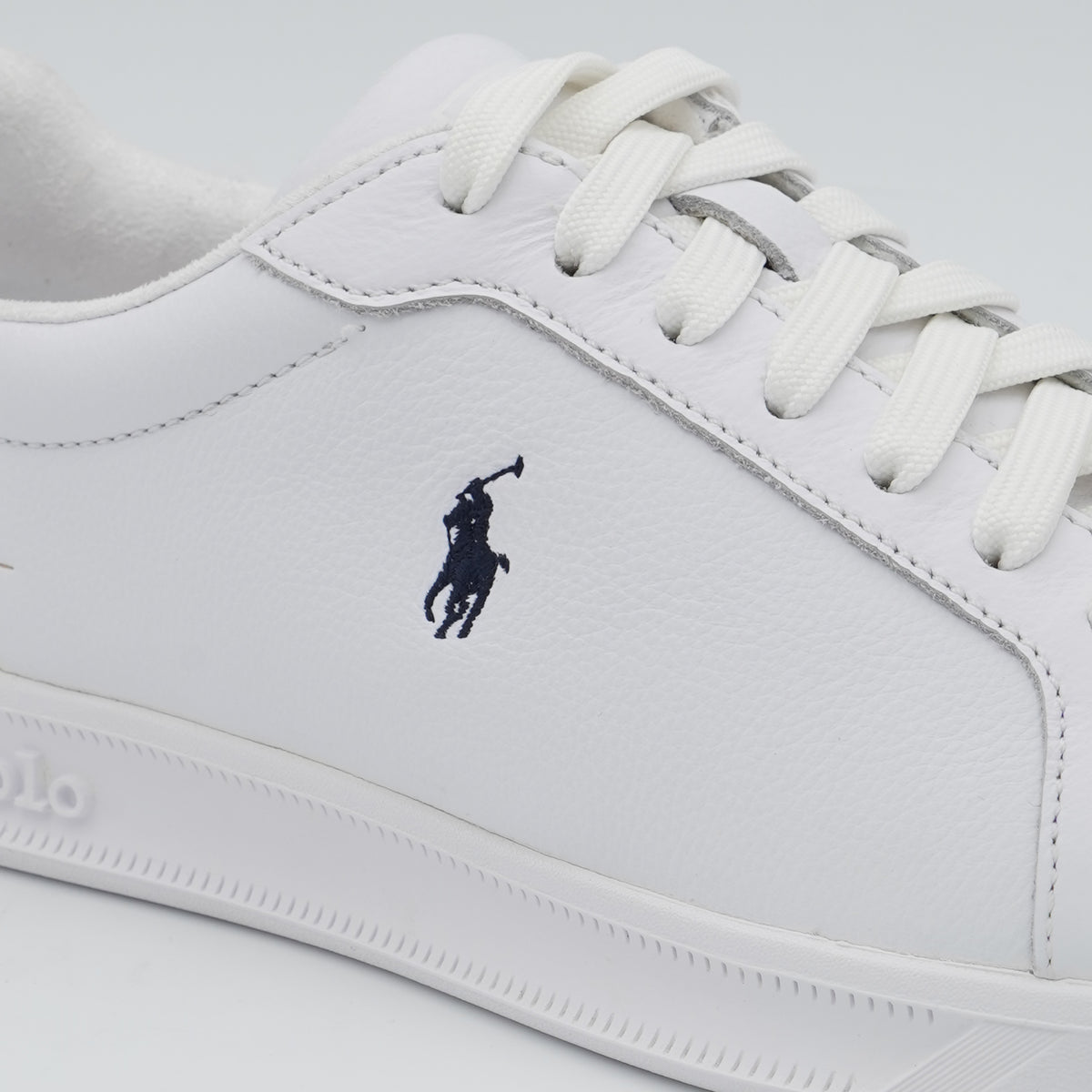 Sneakers Polo Ralph Lauren Heritage Court II 809P10044 002 in Pelle Bianca con Dettagli Blu