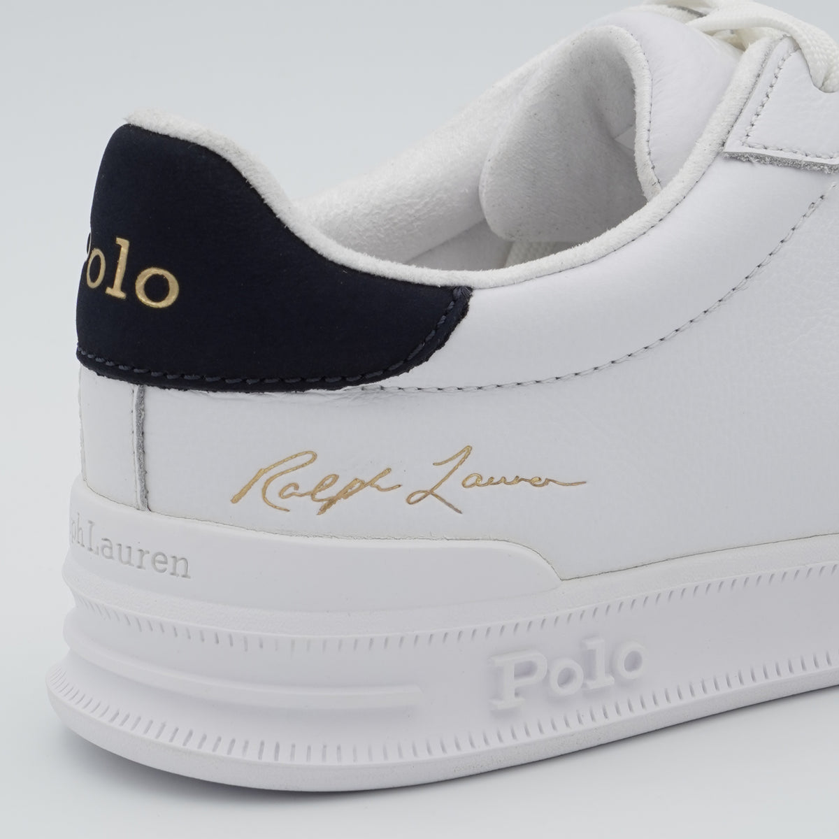Sneakers Polo Ralph Lauren Heritage Court II 809P10044 002 in Pelle Bianca con Dettagli Blu