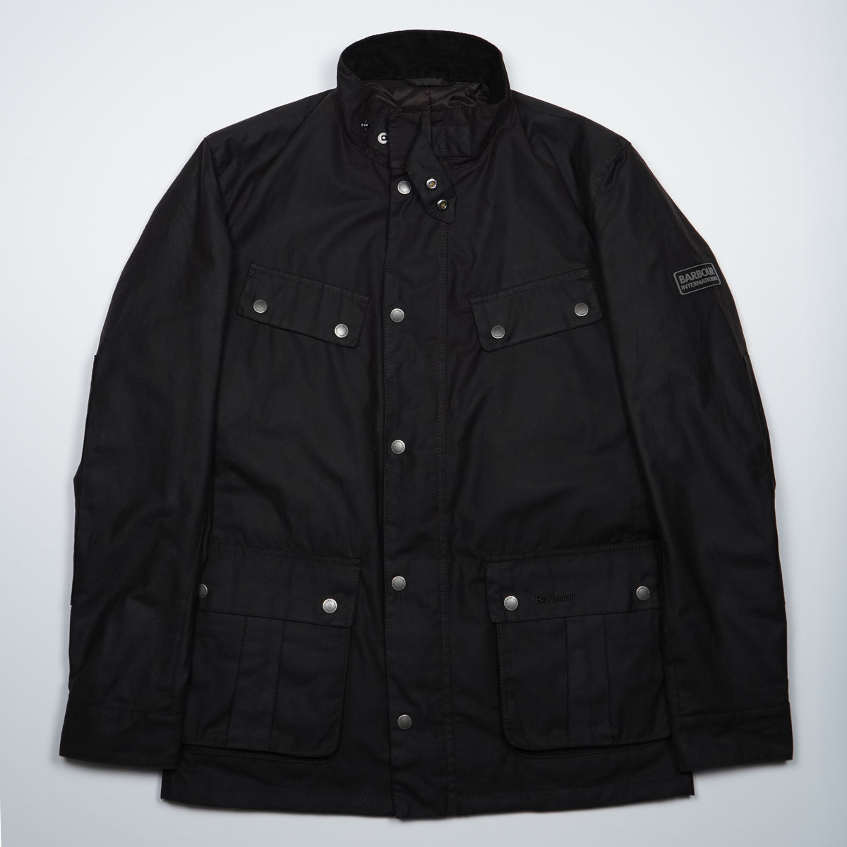 Giubbotto Barbour International Tourer Duke Wax MWX2140 RU52 Rustic Marrone Scuro in Cotone Cerato con Collo in Velluto e Quattro Tasche